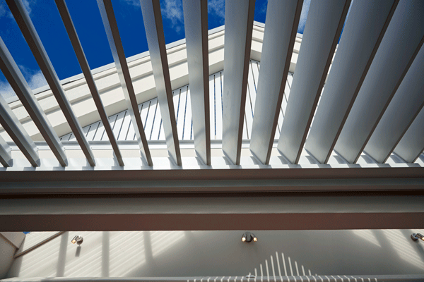 Integrated Series louvre roof offering protection for an existing deck area