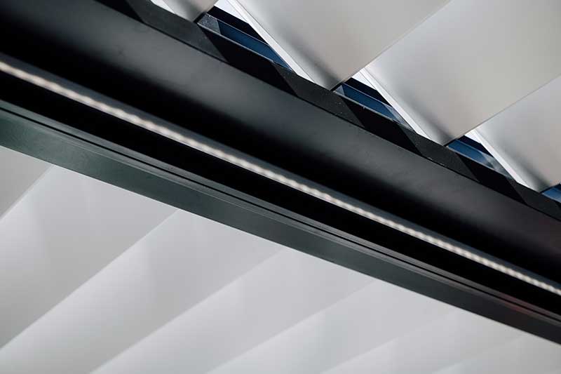 Bask LED lighting strips integrated into top beam