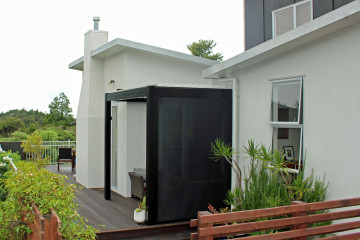 Bask louvre roof custom made to fit this outdoor area outside the kitchen door