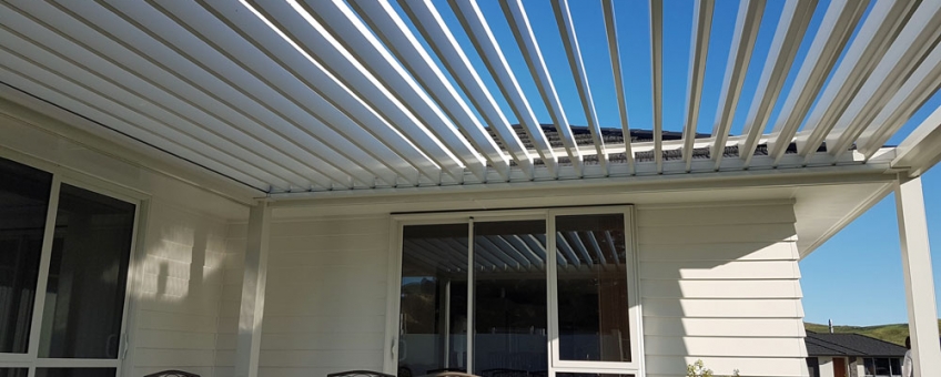 Freestanding Bask Louvre Roof fitted on North Facing Patio opened up to let the winter sun in